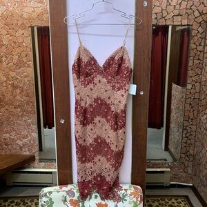 Looks new Elegant Lace Women’s Dress in Red and Cream
